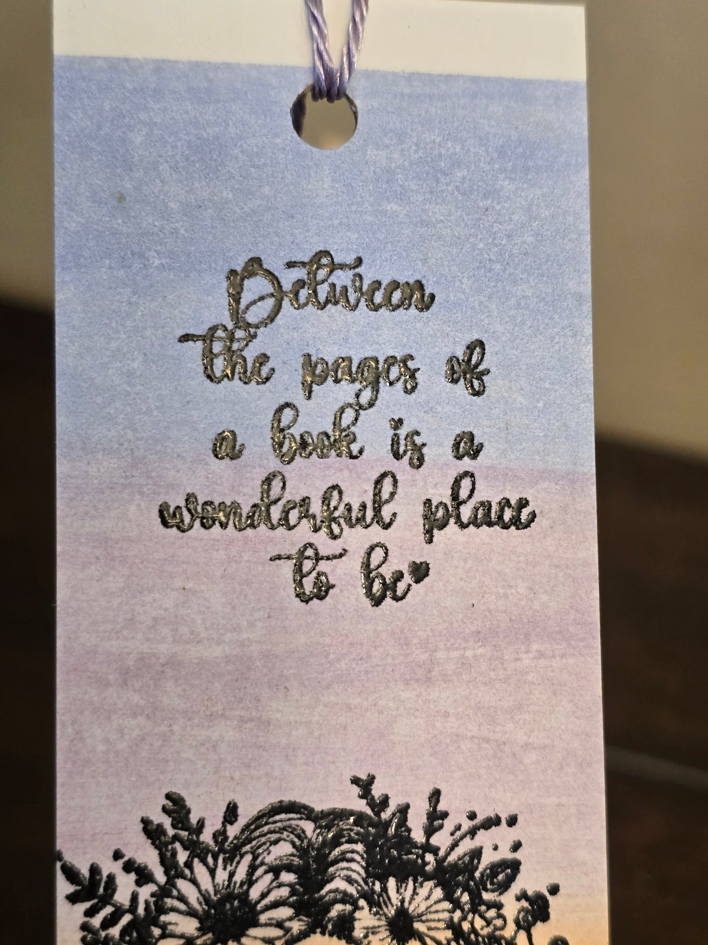 "Between the pages of a book is a wonderful place to be." Watercolor Bookmark