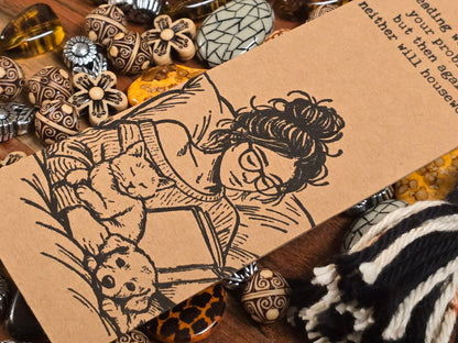 "Reading won't solve your problems, but then again, neither will housework." Bookmark