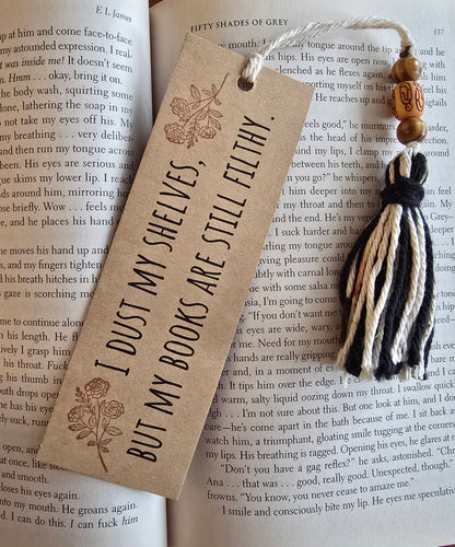 "I dust my shelves, but my books are still filthy." Bookmark
