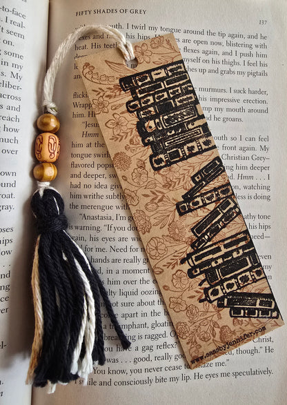 "I dust my shelves, but my books are still filthy." Bookmark