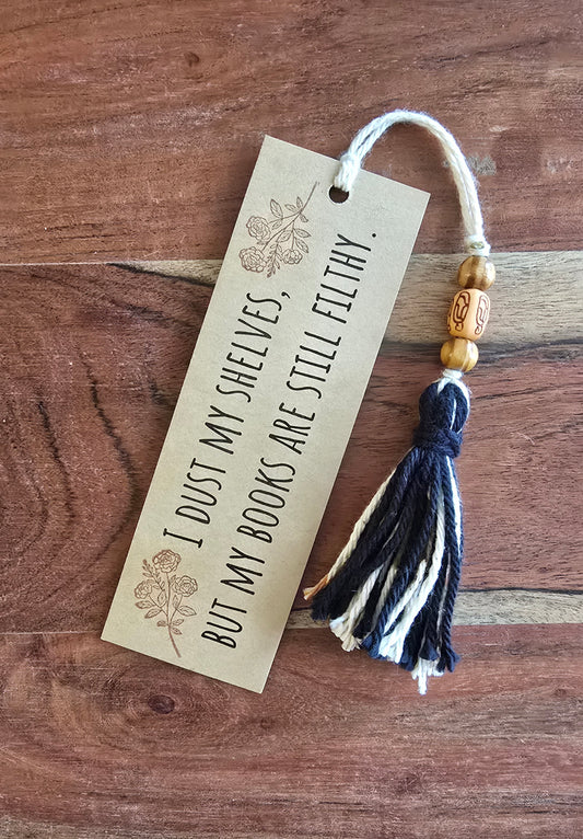 "I dust my shelves, but my books are still filthy." Bookmark