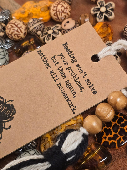 "Reading won't solve your problems, but then again, neither will housework." Bookmark